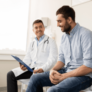 doctor discussing TRT results and treatments with patients at Omniya Clinic