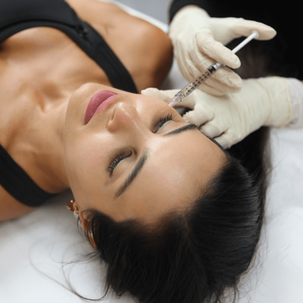 Image of someone getting cheek filler