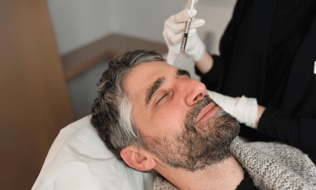 Forehead botox treatment on a man