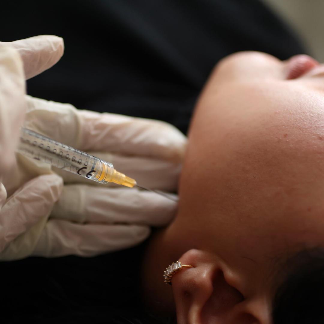 Close up of neck lift botox treatment happening