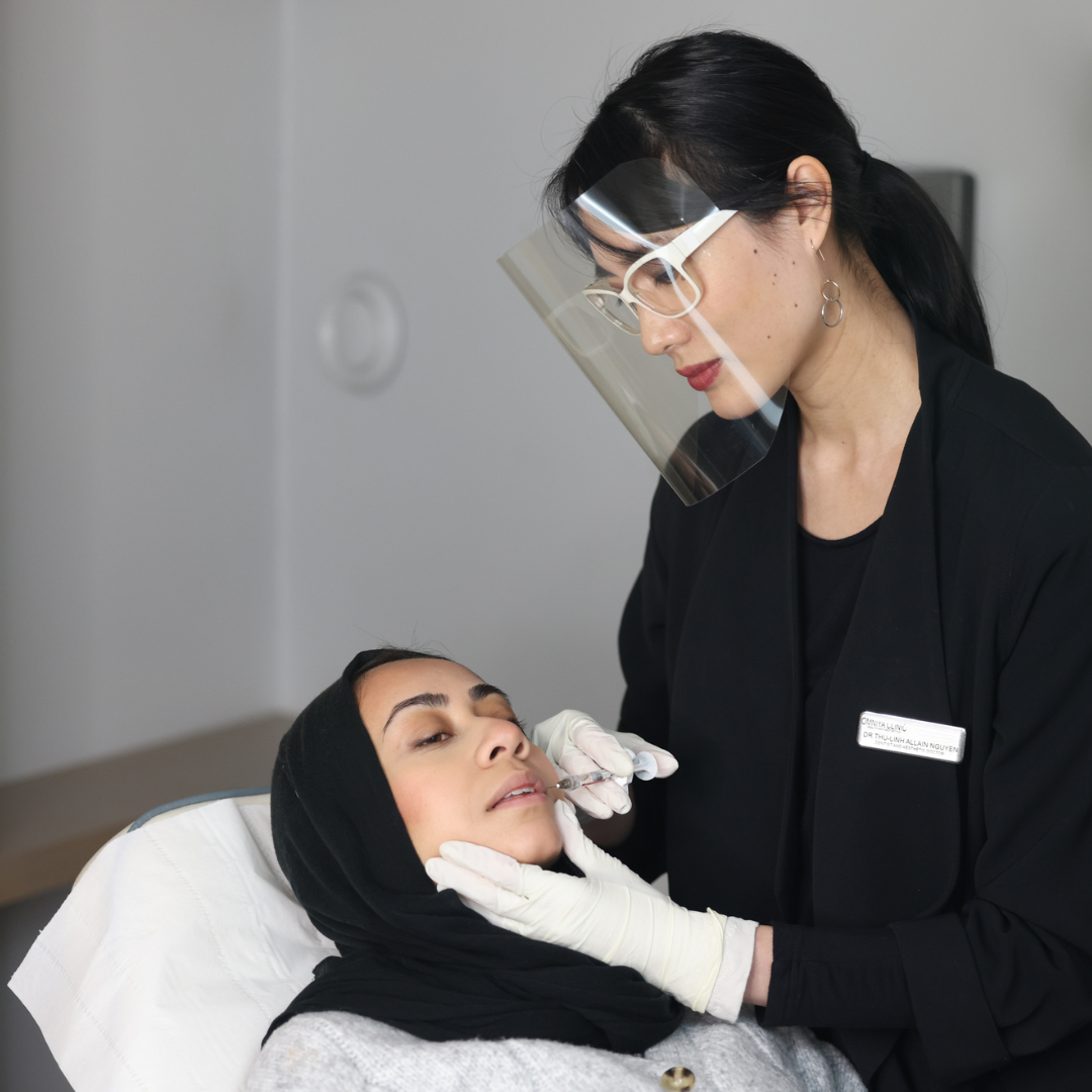 doctor injecting lip filler for patient with thin lips