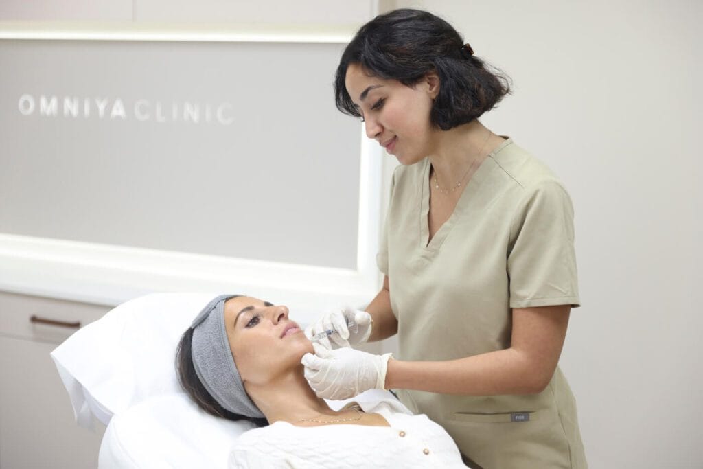 Dr Shahd twijiri performing chin fillers